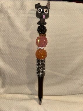 Dante from coco Disney Doorable beaded pen